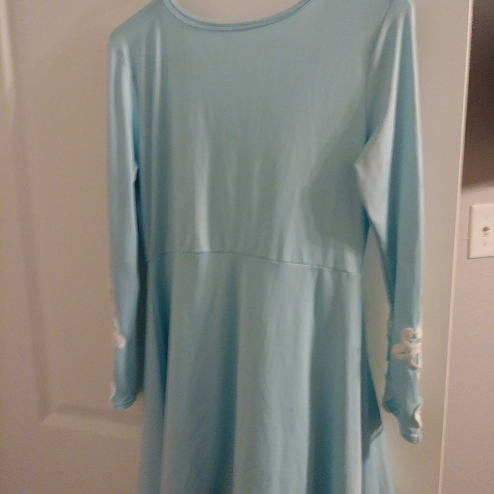 Baby blue blouse with lace on sleeves